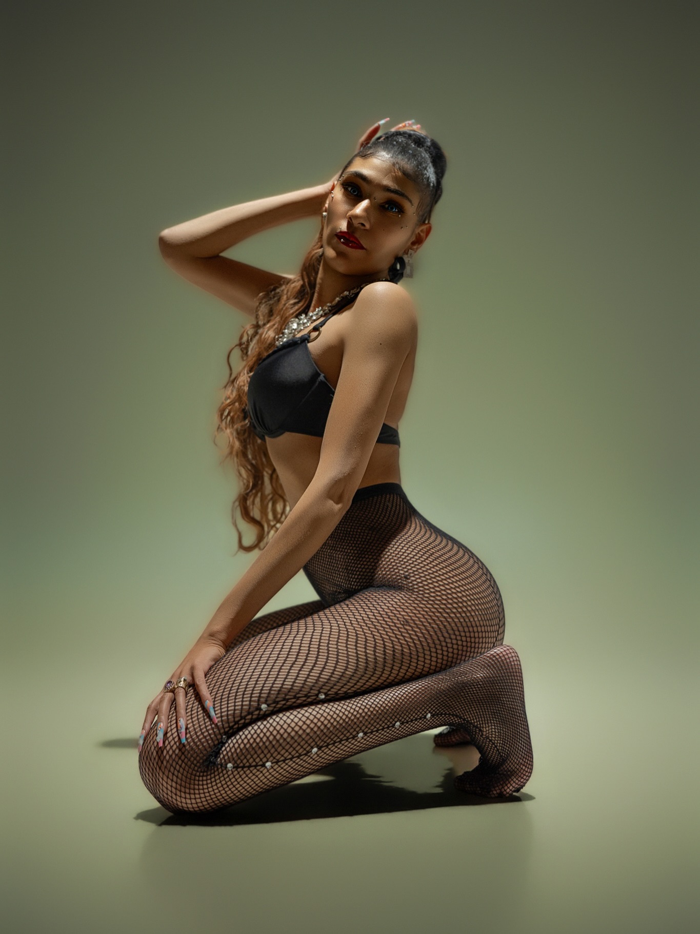 Photo by Eric 📸 on May 02, 2026. May be an image of one or more people, makeup, fishnet stockings and tights.